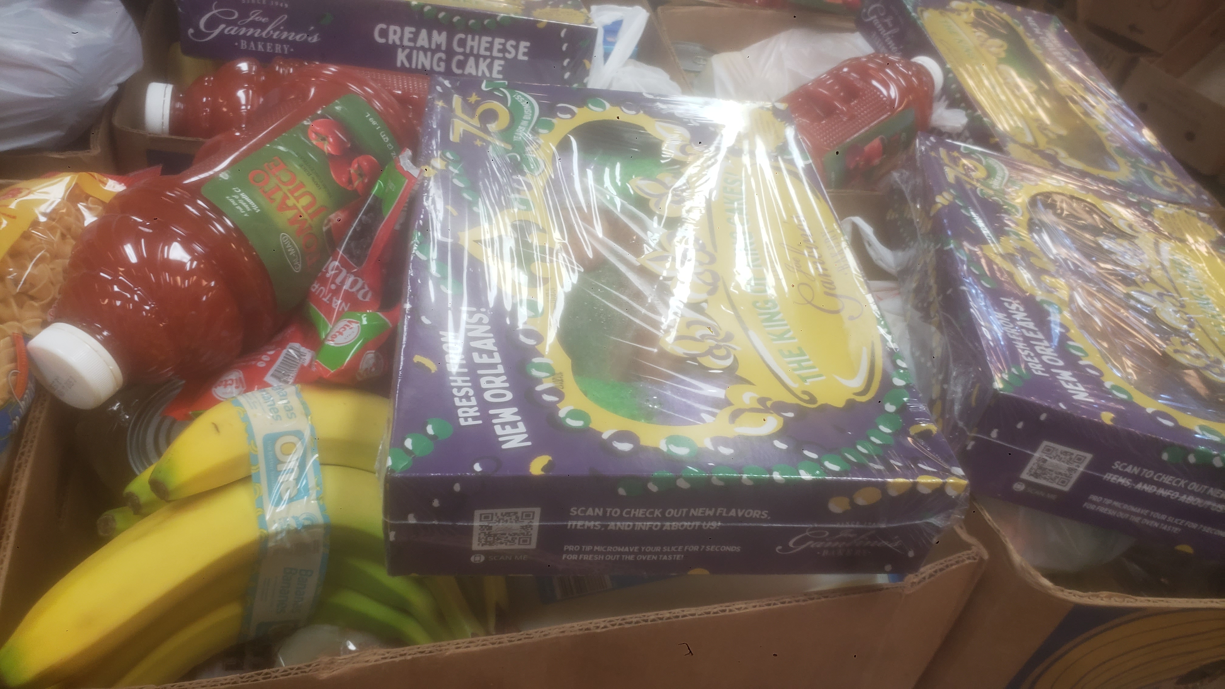 Food and drinks filled banana box.